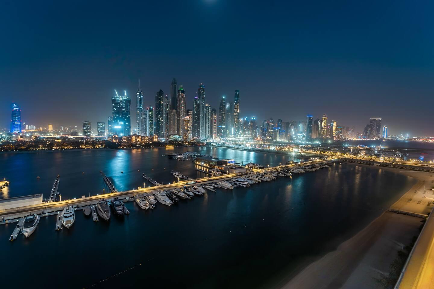 Cityscape building overlooking blue lake
