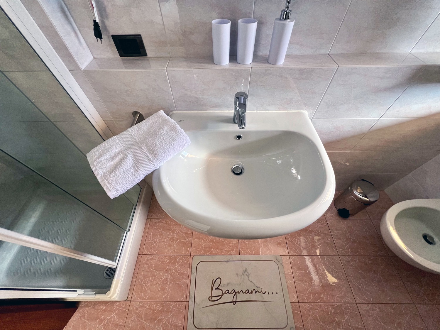 Toilet with washbasin and faucet in bathroom