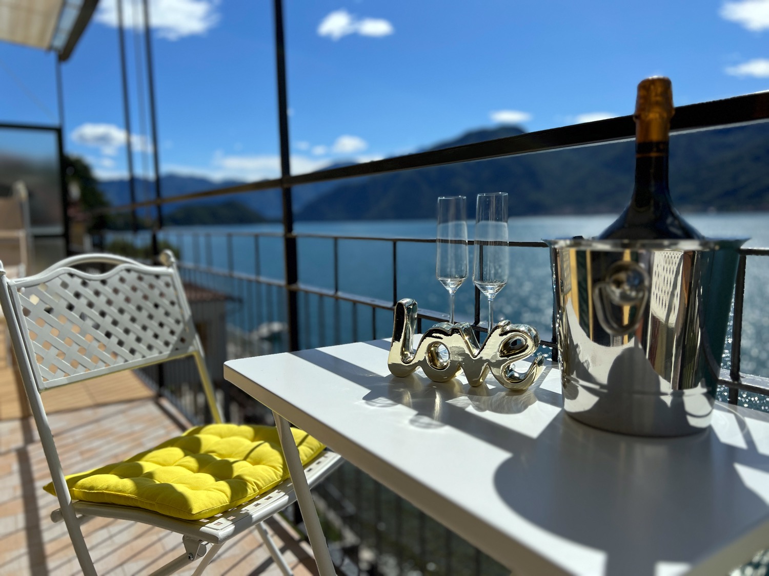 Blue cloudy sky with outdoor furniture and tableware