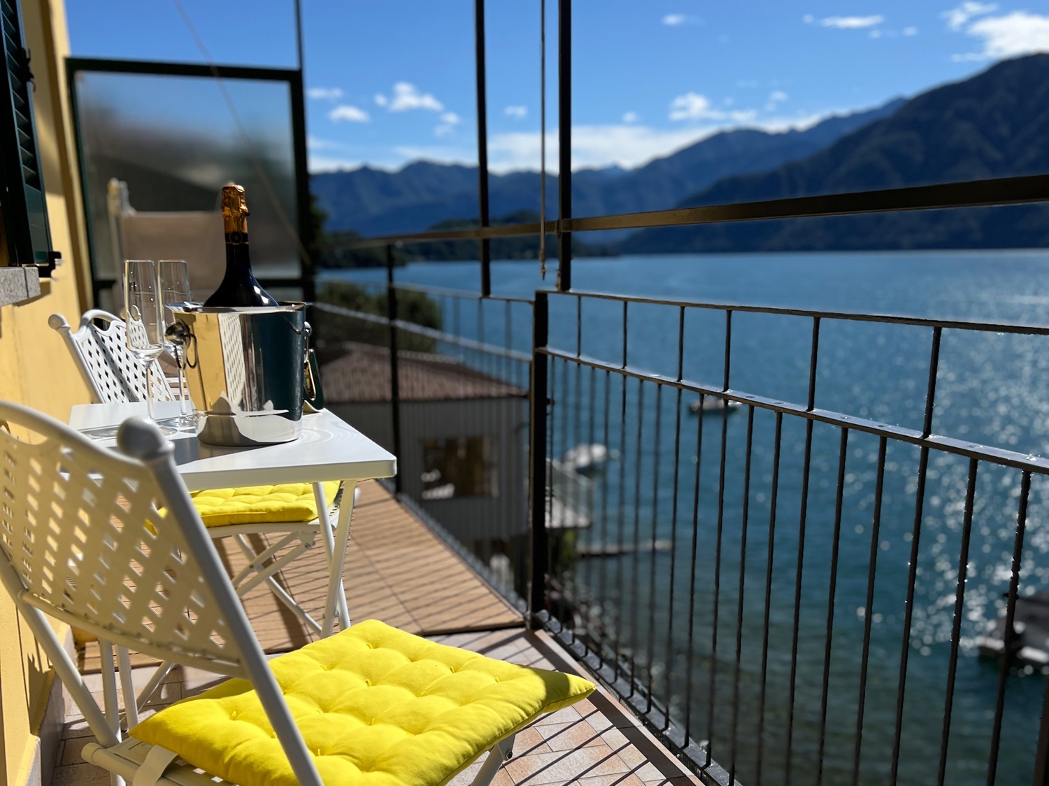 Outdoor furniture on hill near blue cloudy sky