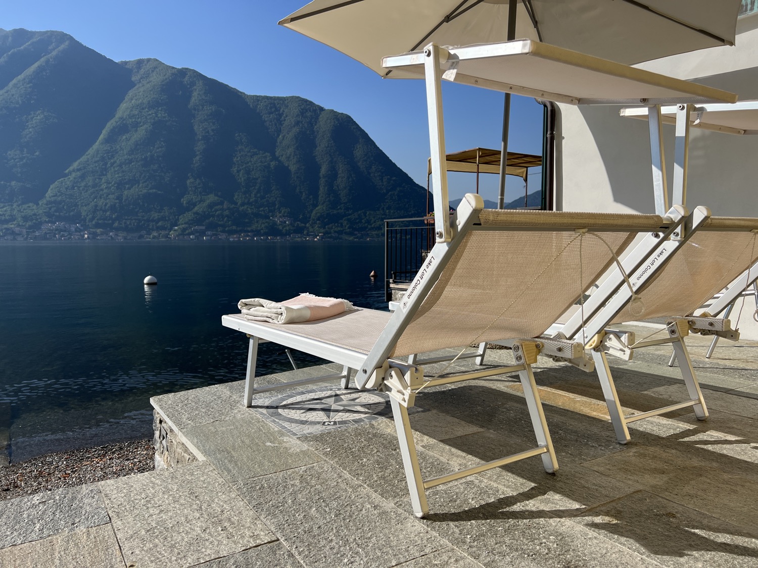 Blue sky, chairs, umbrella, folding table