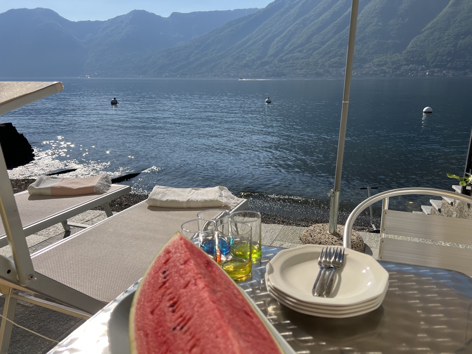 Water-filled lake on grassy hill