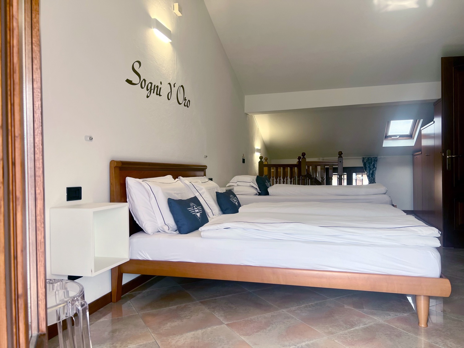 Furniture room with wooden bed and bedding