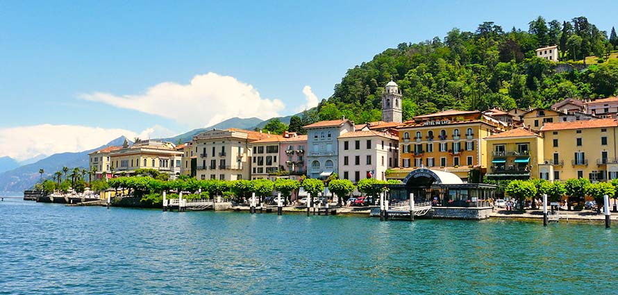 Blue cloudy sky over hill and lake