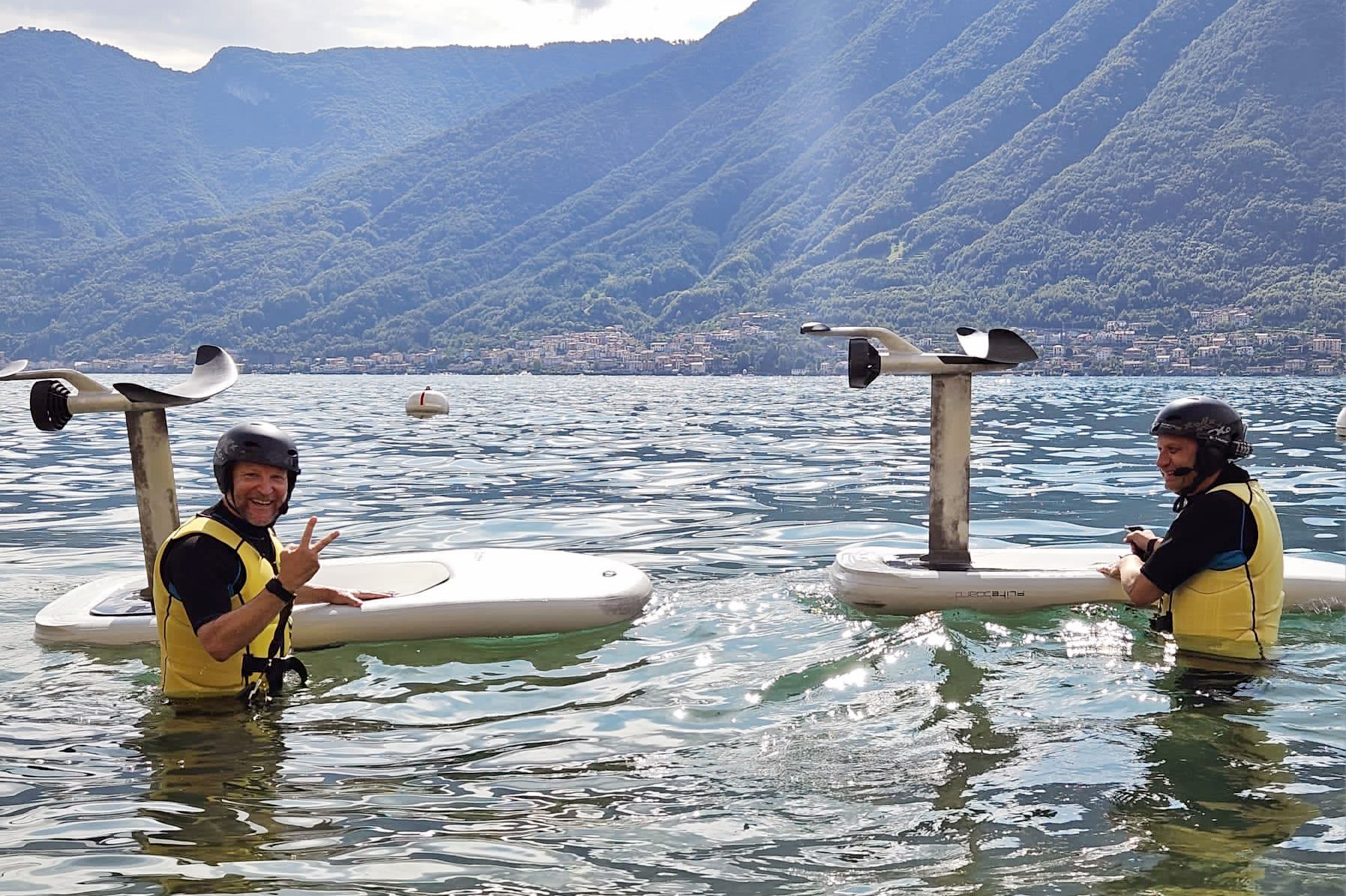 Sportsman on hill in water with life jacket