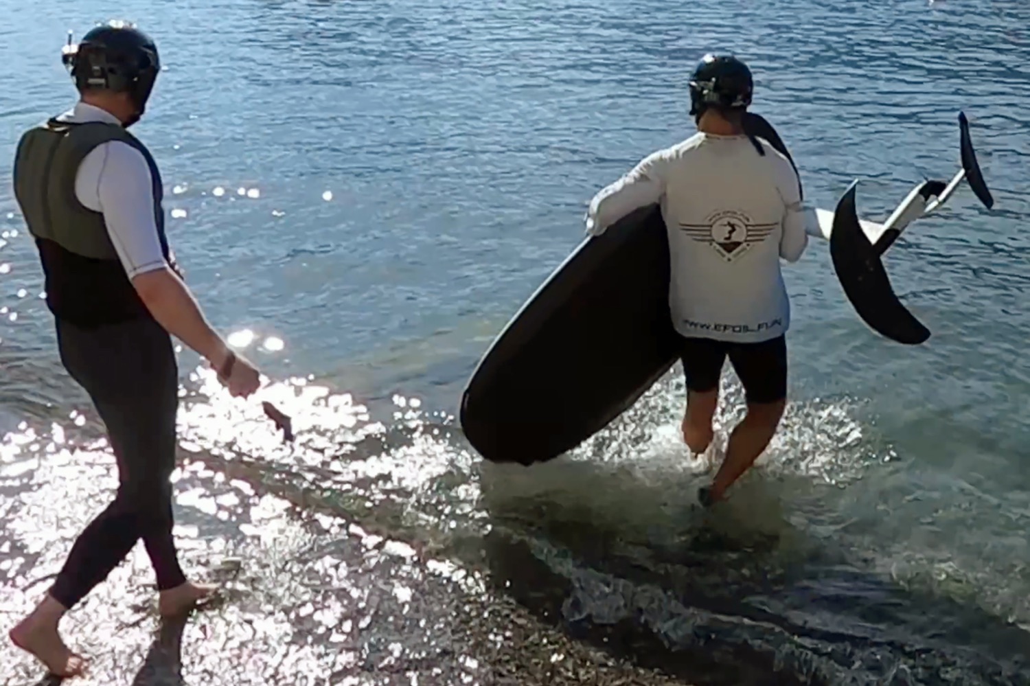People playing sports with wetsuits