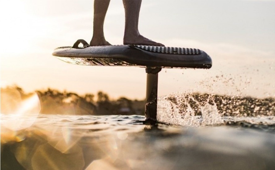 People surfing outdoors on sunny day