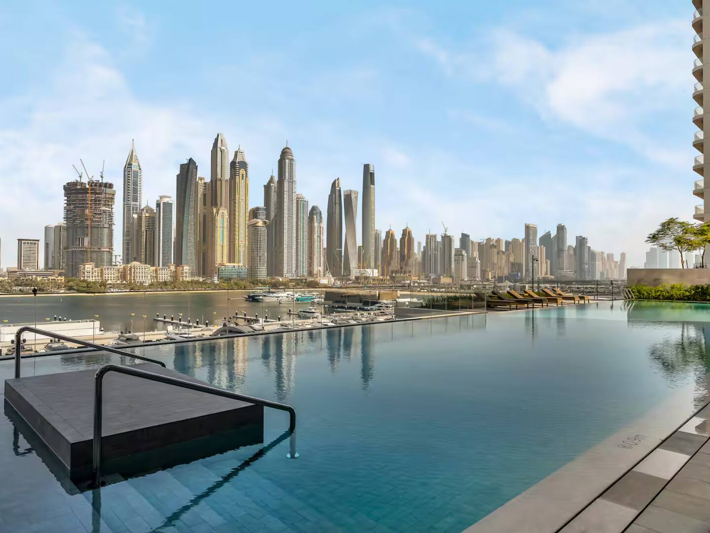 Skyscraper in cloudy sky