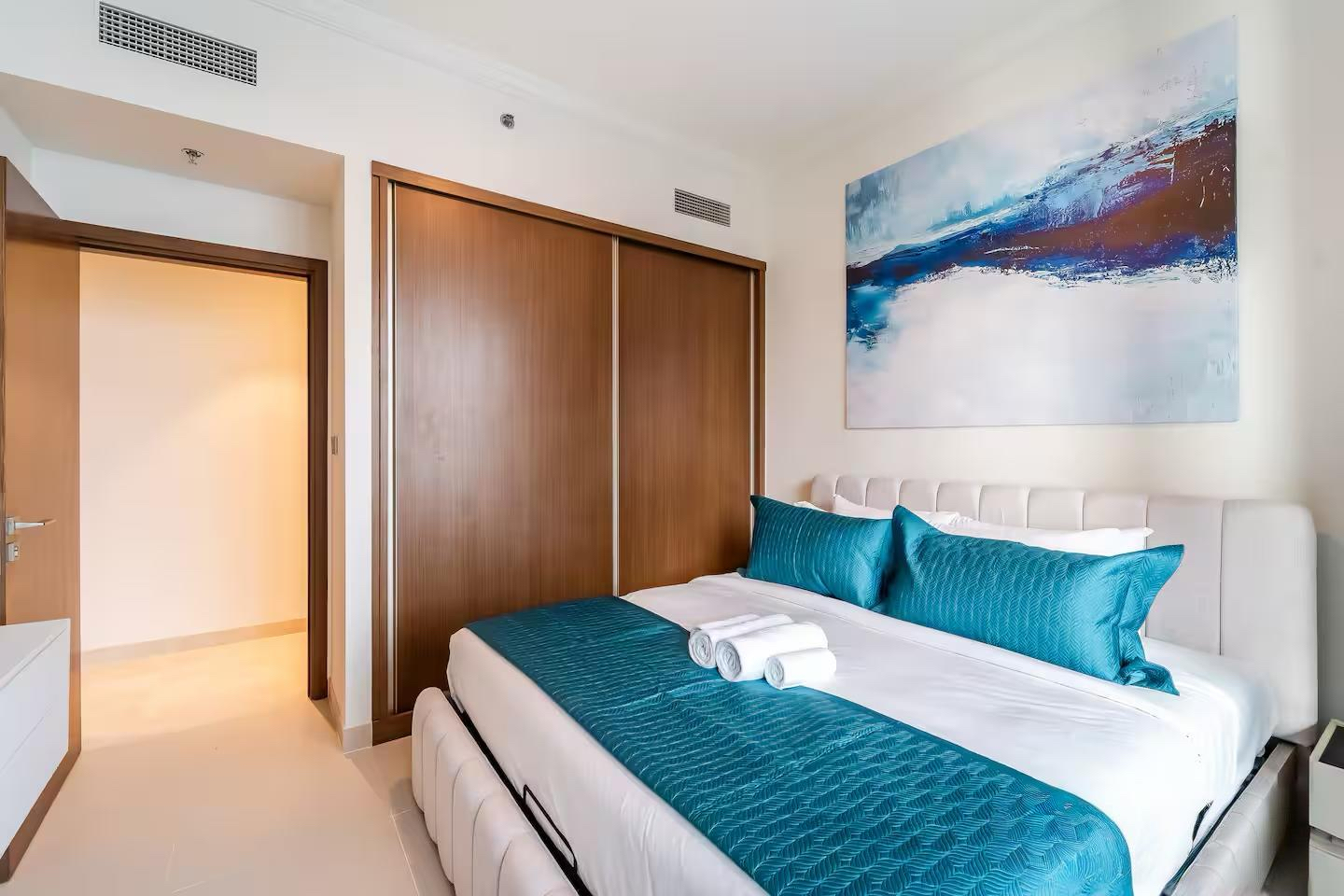 Decorated bedroom with bed and pillows