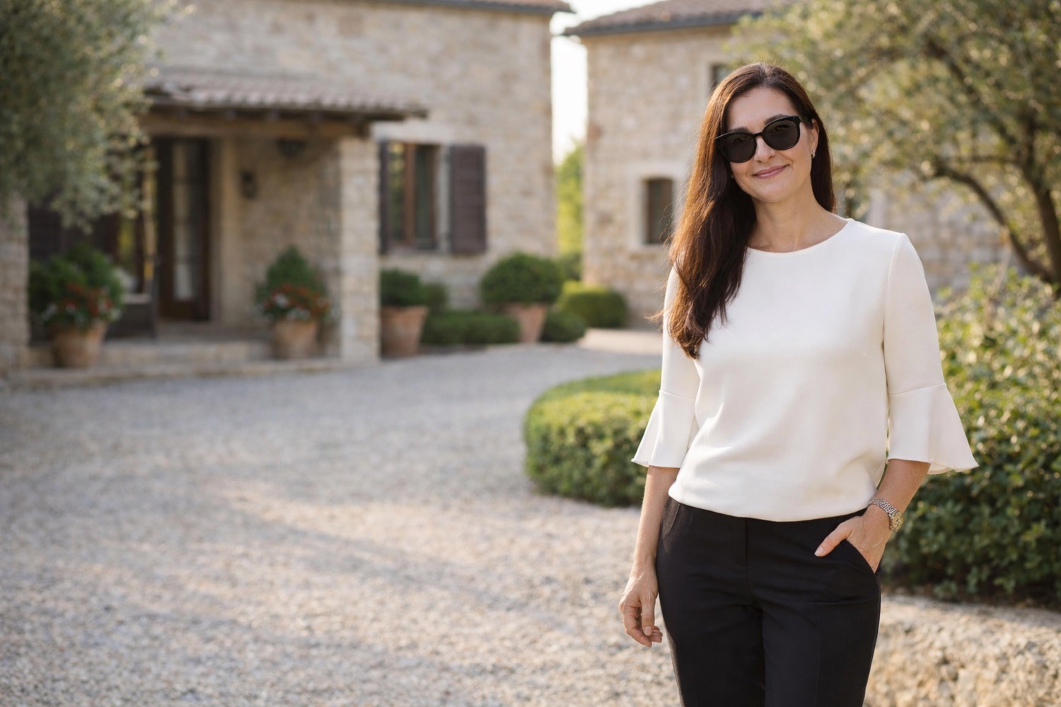 person wearing sunglasses looks through optical equipment